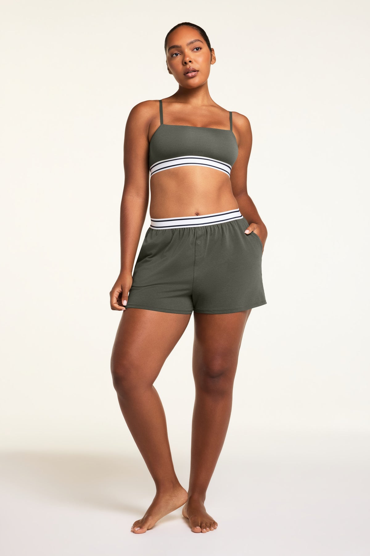 Back on-model view of the Cloud Cotton Short in Olive paired with the Cloud Cotton Bandeau Bralette in Olive.