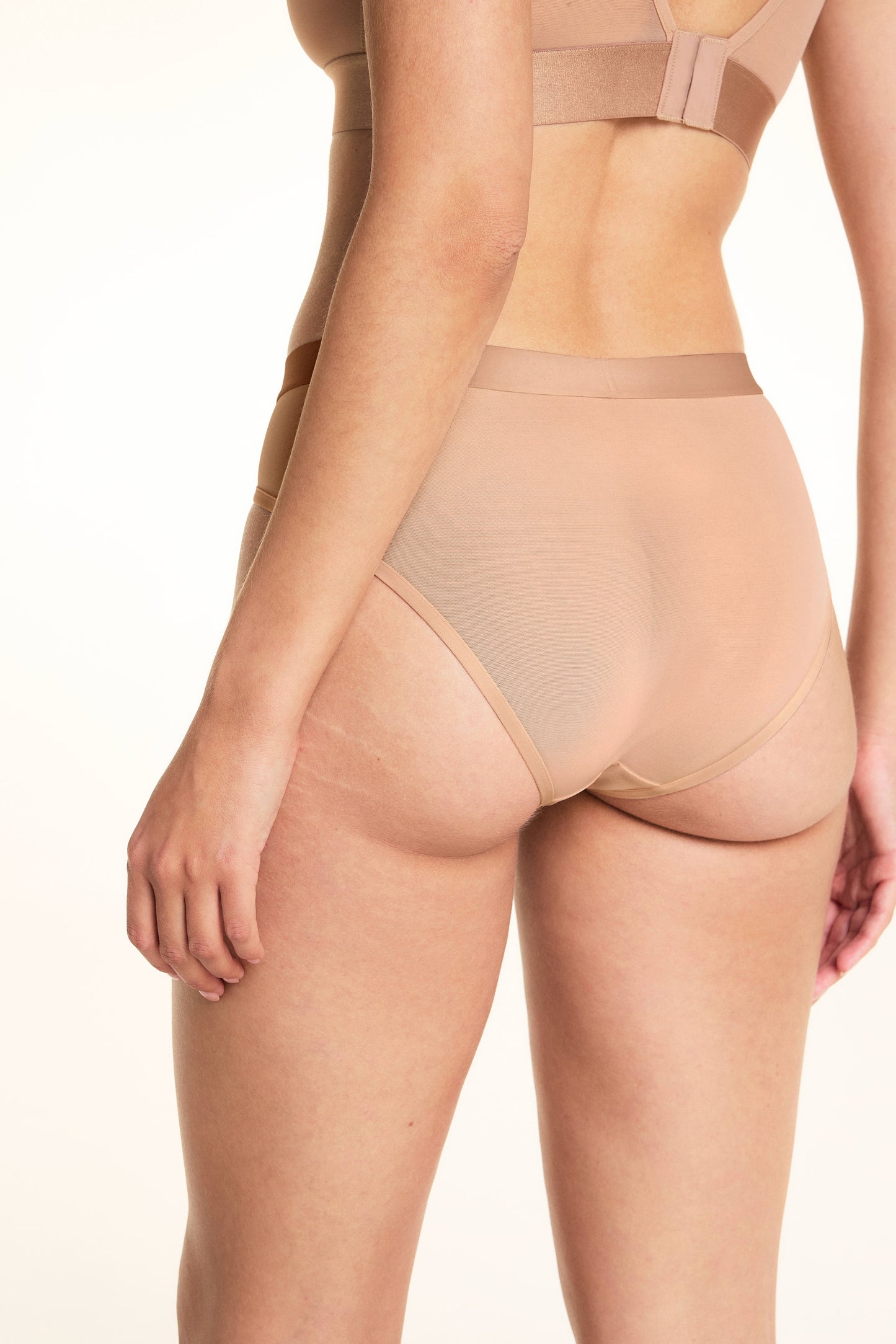 Close up back view of the ComfortMesh Highwaist Brief in Taupe.