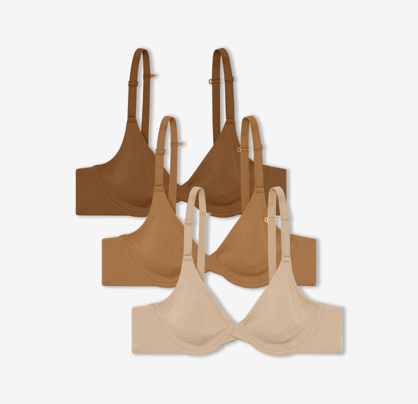 A trio of Harper Wilde's Base Unlined Bras in Brown, Tan, and Beige which offers ultra-soft underwire support with no lining.