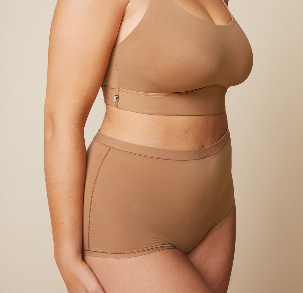Close up front view of the Bliss Boyshort in Tan.