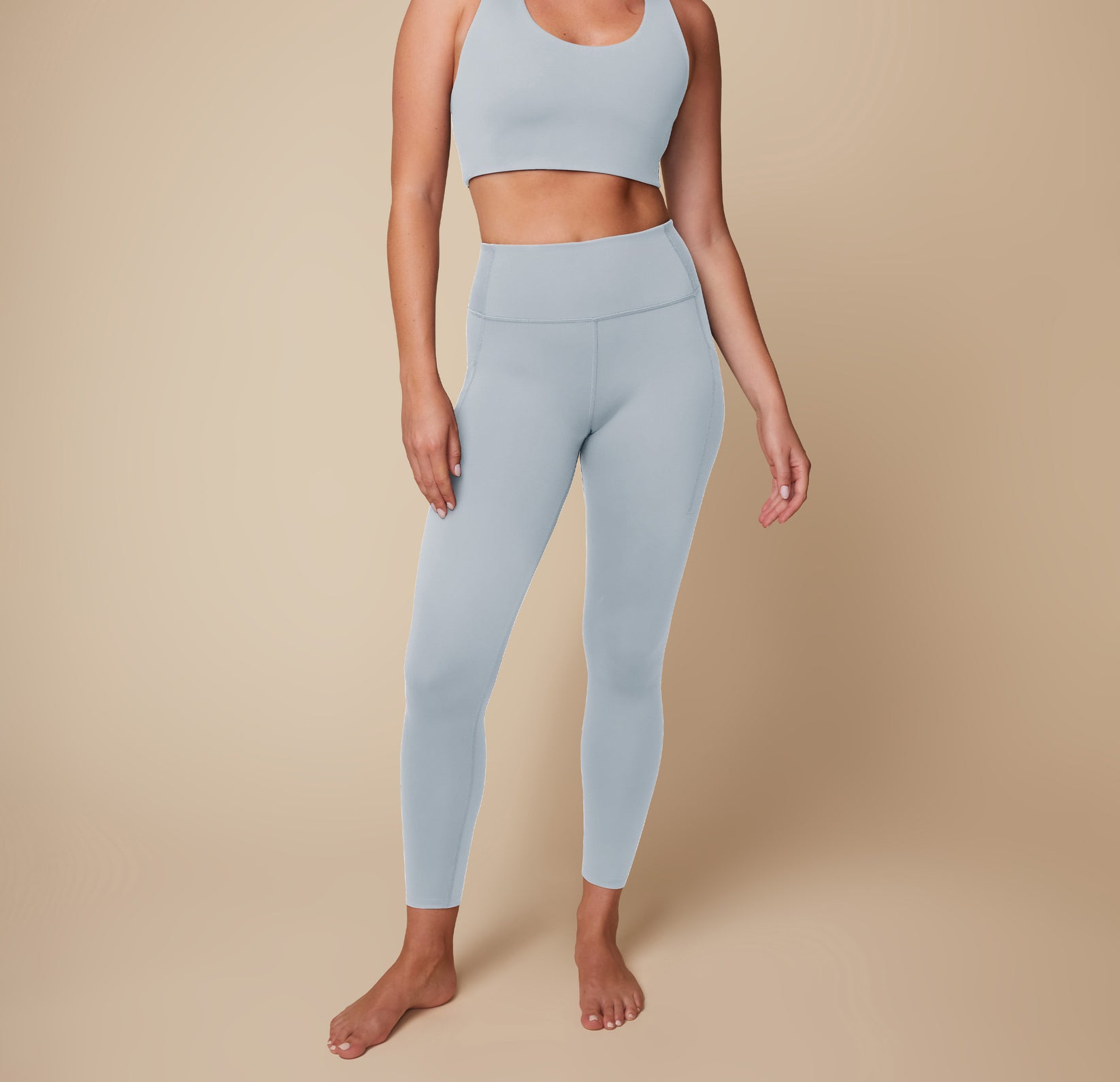 Megan modeling the Flex Convertible Sports Bra and Flex High Rise Legging in Thistle, full front view. sizing: Megan wears size Medium