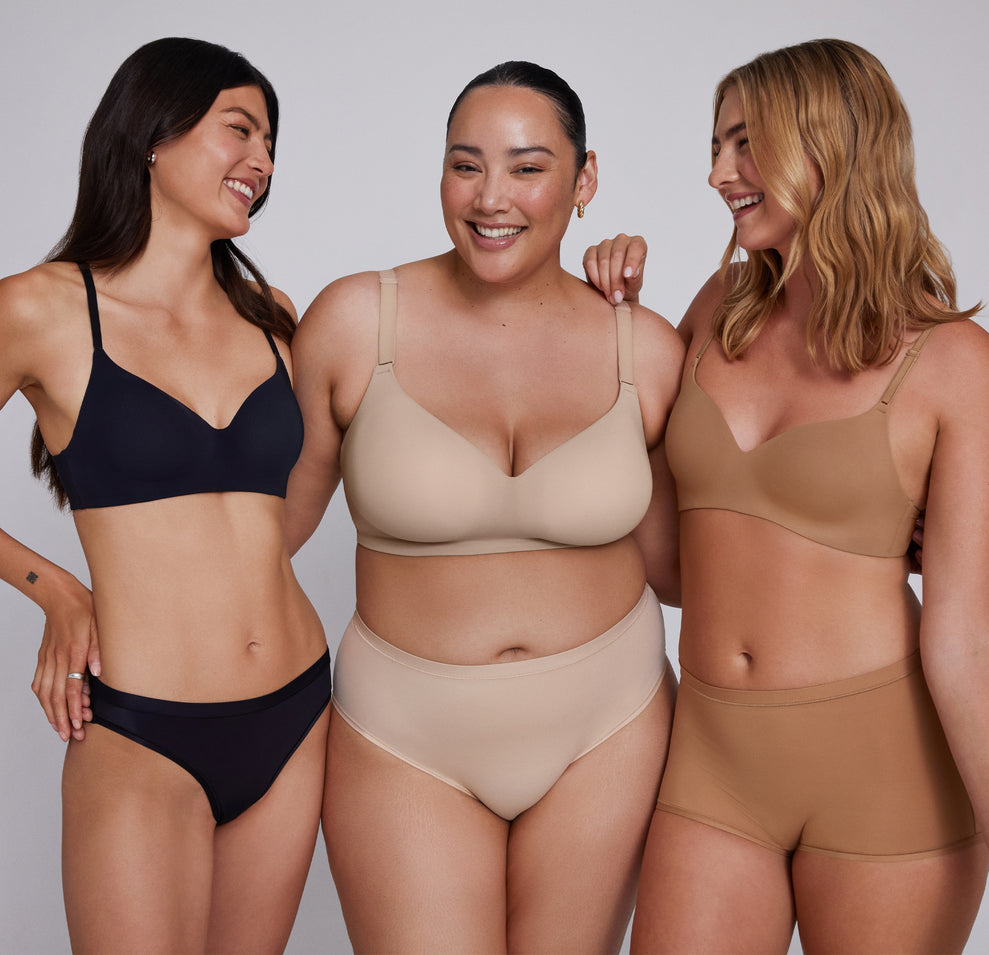 Ally, alongside Bianca and Megan, wearing the Base Wirefree T-Shirt Bra in Black, Beige, and Tan, emphasizing inclusivity and color variety.