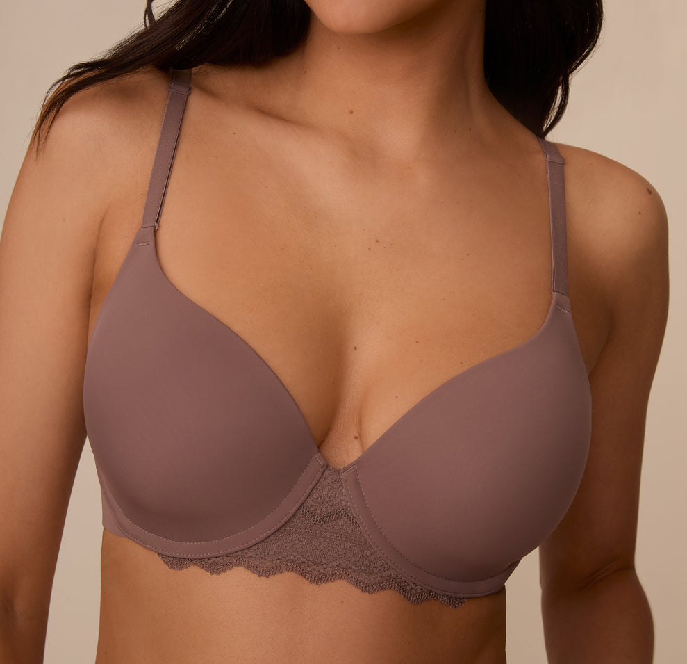 Close-up of Marcela in the Base Lace T-Shirt Bra in Mauve. This angle focuses on the seamless cups and the delicate lace trim along the bottom band.
