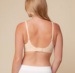 Back view of Megan in the Bliss Plunge Adjustable Bralette in Beige and Lounge Rib Boyshort in White, highlighting the adjustable back straps and soft, ribbed fabric of the boyshort for a relaxed, comfortable feel.