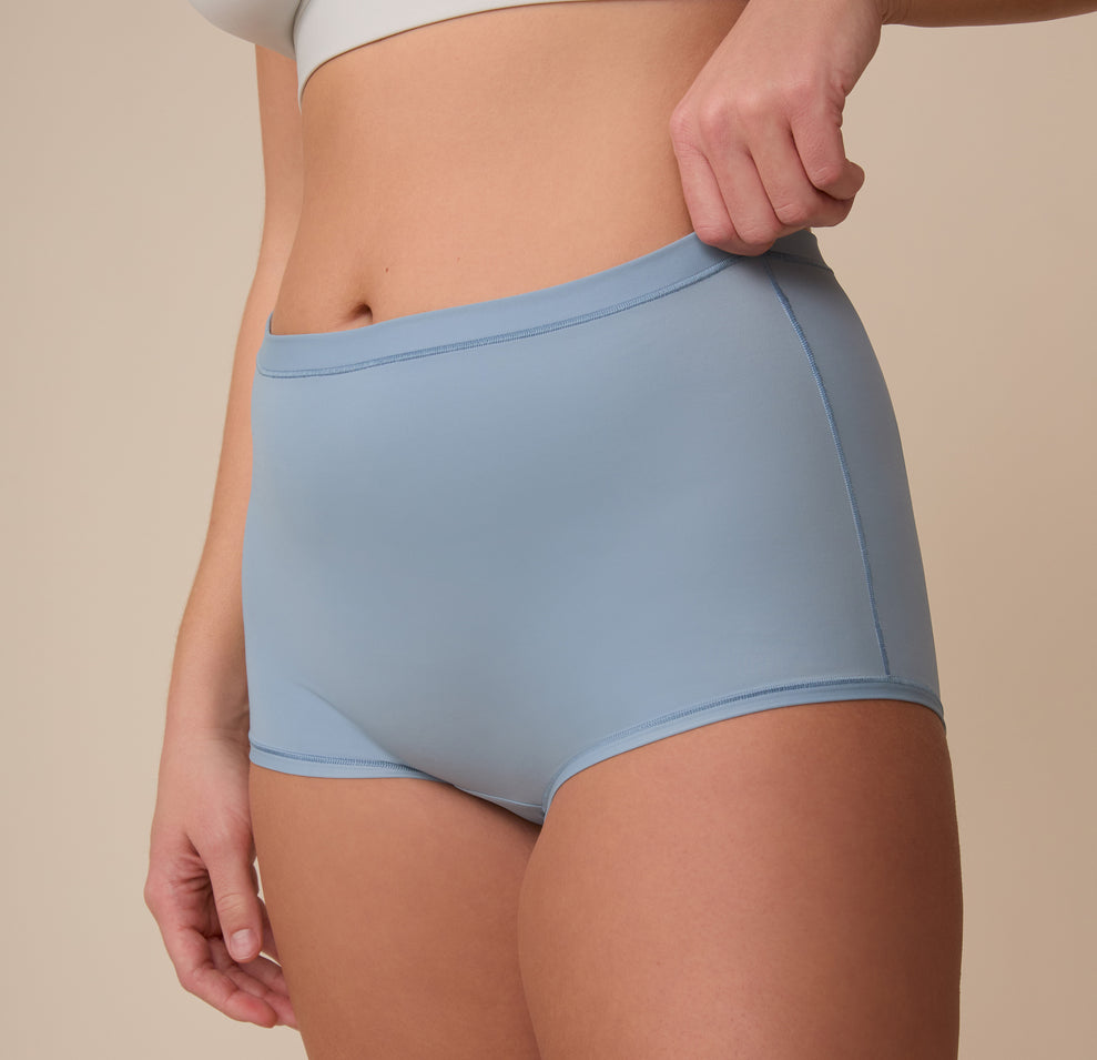 Close-up of Sonnie in the Bliss Boyshort in Glacier. The image highlights the clean stitching, minimal seam waistband, and ultra-smooth fabric.