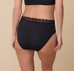 Back view of Gracie in the Bliss Lace Highwaist Brief in Black, highlighting the smooth, full-coverage design and lightweight lace waistband.