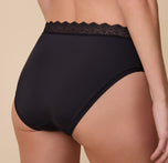 Close-up of the back of the Bliss Lace Highwaist Brief in Black on Gracie, focusing on the full-coverage fit and lightweight, breathable lace waistband.