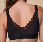 A detailed look at the back of the Bliss Lace Bralette in Black, focusing on the soft, lace-trimmed V-back.