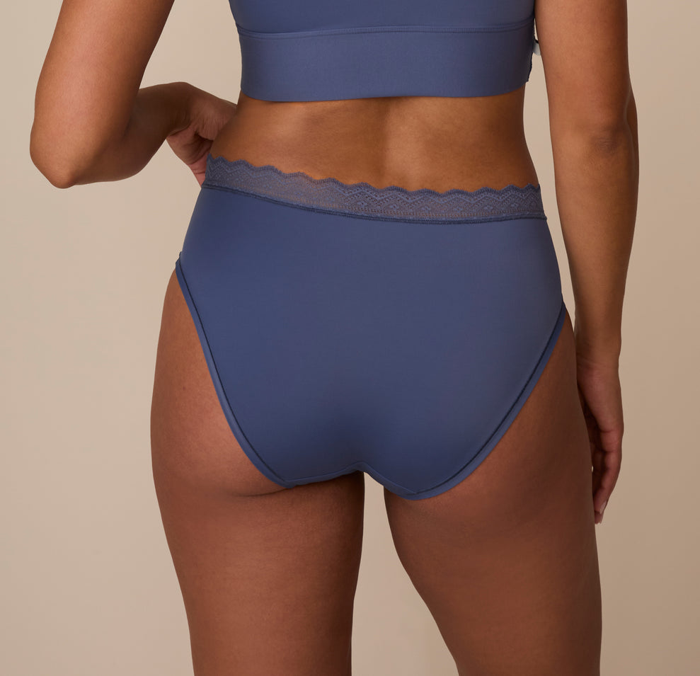 Back view of Nemesis in the Bliss Lace Highwaist Brief in Twilight. The brief provides full cheek coverage with a clean finish and no visible seams for all-day comfort.