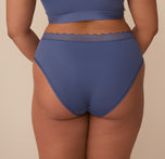 Back view of Zarria in the Bliss Lace Highwaist Brief in Twilight. The image shows the contoured back seam and soft coverage for a barely-there feel that still supports.