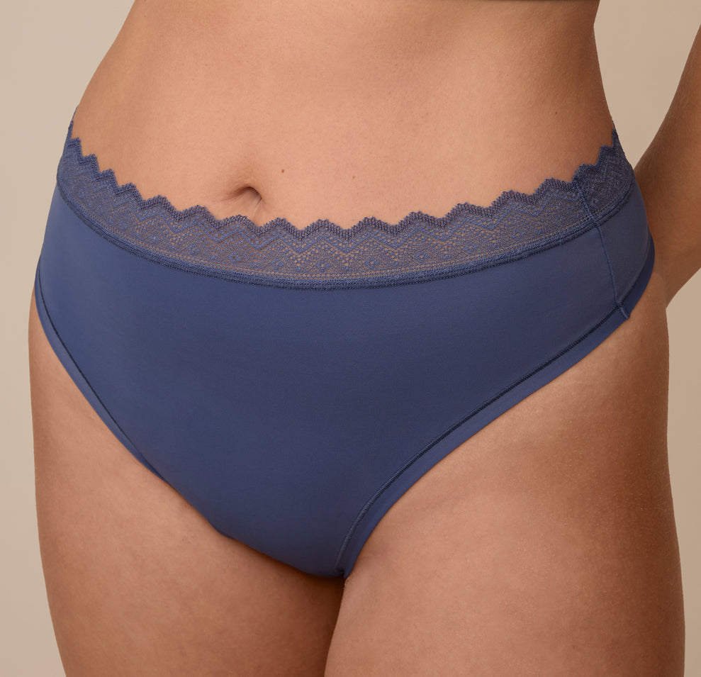 Close-up detail of the lace waistband on the Bliss Lace Highwaist Thong in Twilight. The tonal lace trim adds softness and stretch, complementing the minimal design.