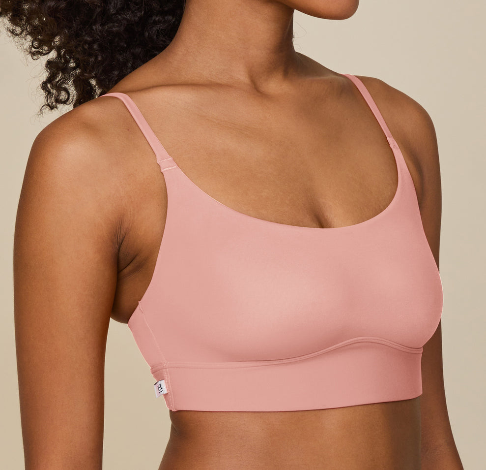Close-up of Zoe’s upper body in the Bliss Scoop Bralette in Dusty Rose, showing the comfy fit of the bralette’s straps and fabric against her skin.