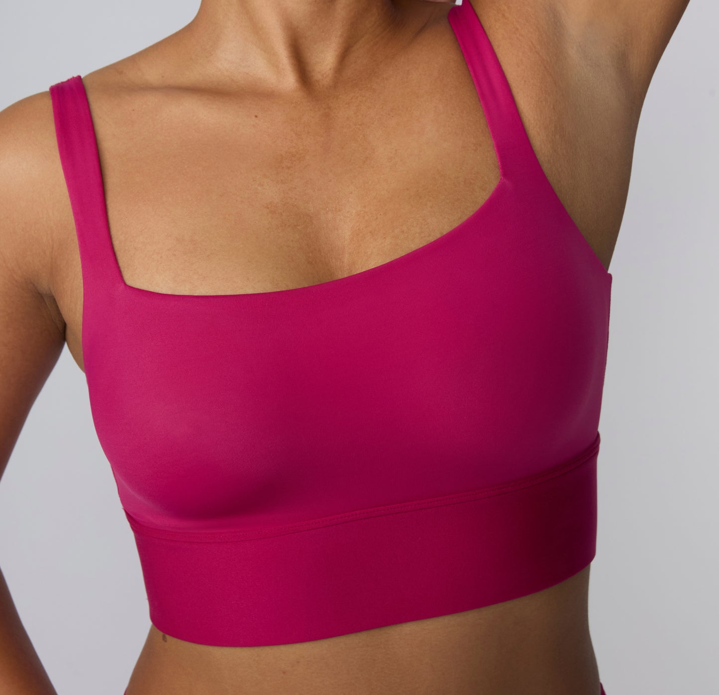 Close-up on a white studio backdrop of the Bliss Square Neck Bralette in Winterberry, focusing on the square neckline, wide straps, and soft microfiber texture.