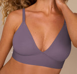 Close-up of Freya wearing the Bliss Triangle Bralette in Eclipse, showing the plunging neckline, molded cups, and supportive band. The details highlight the comfort and contouring of the wire-free design.