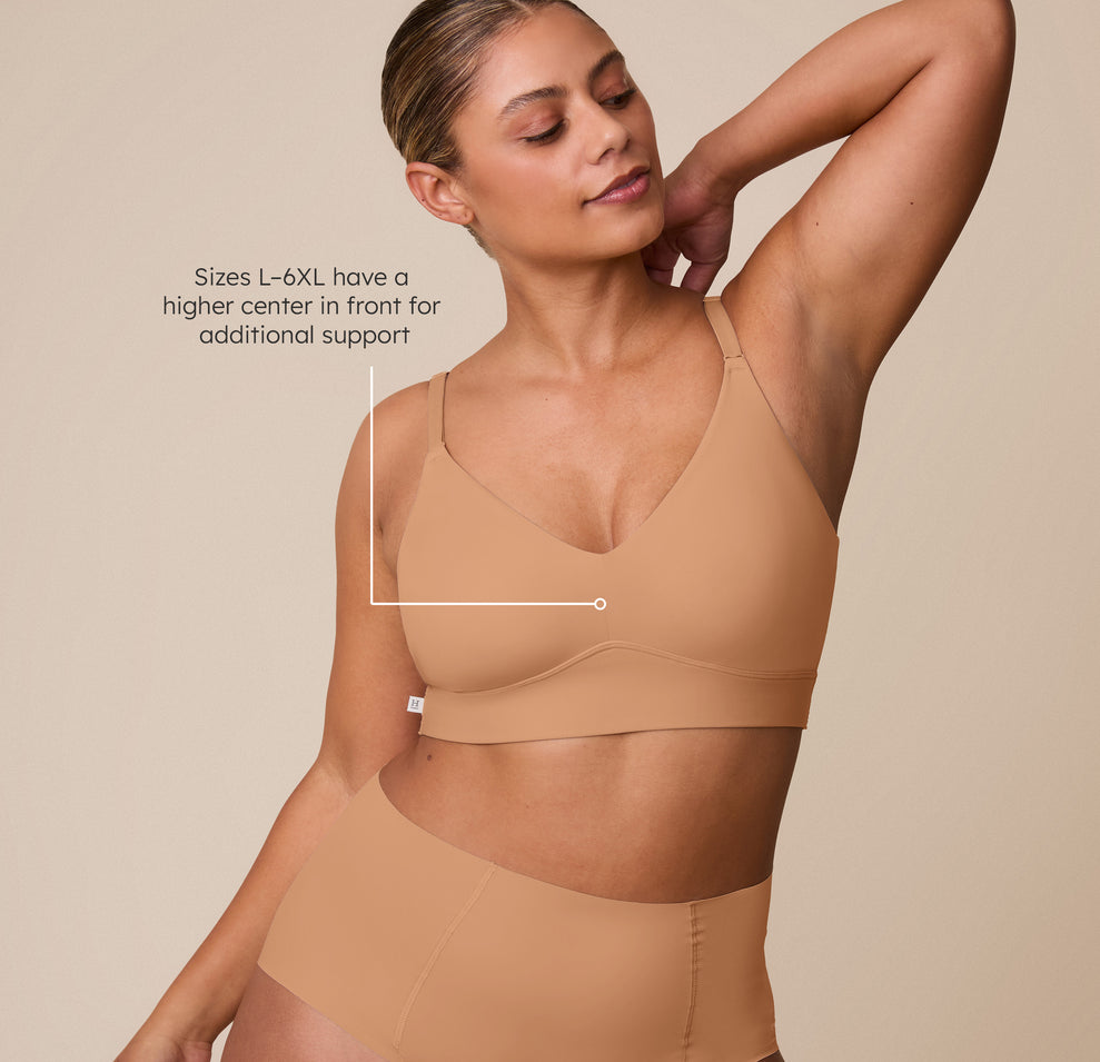India wearing the Bliss Triangle Bralette in Tan, highlighting a fit designed for sizes L-6XL, featuring a slightly higher center front for added support. sizing: India wears size Large
