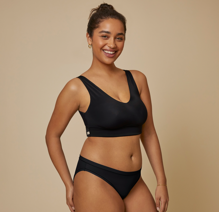 Woman wearing the Bliss Bralette in the color Black
