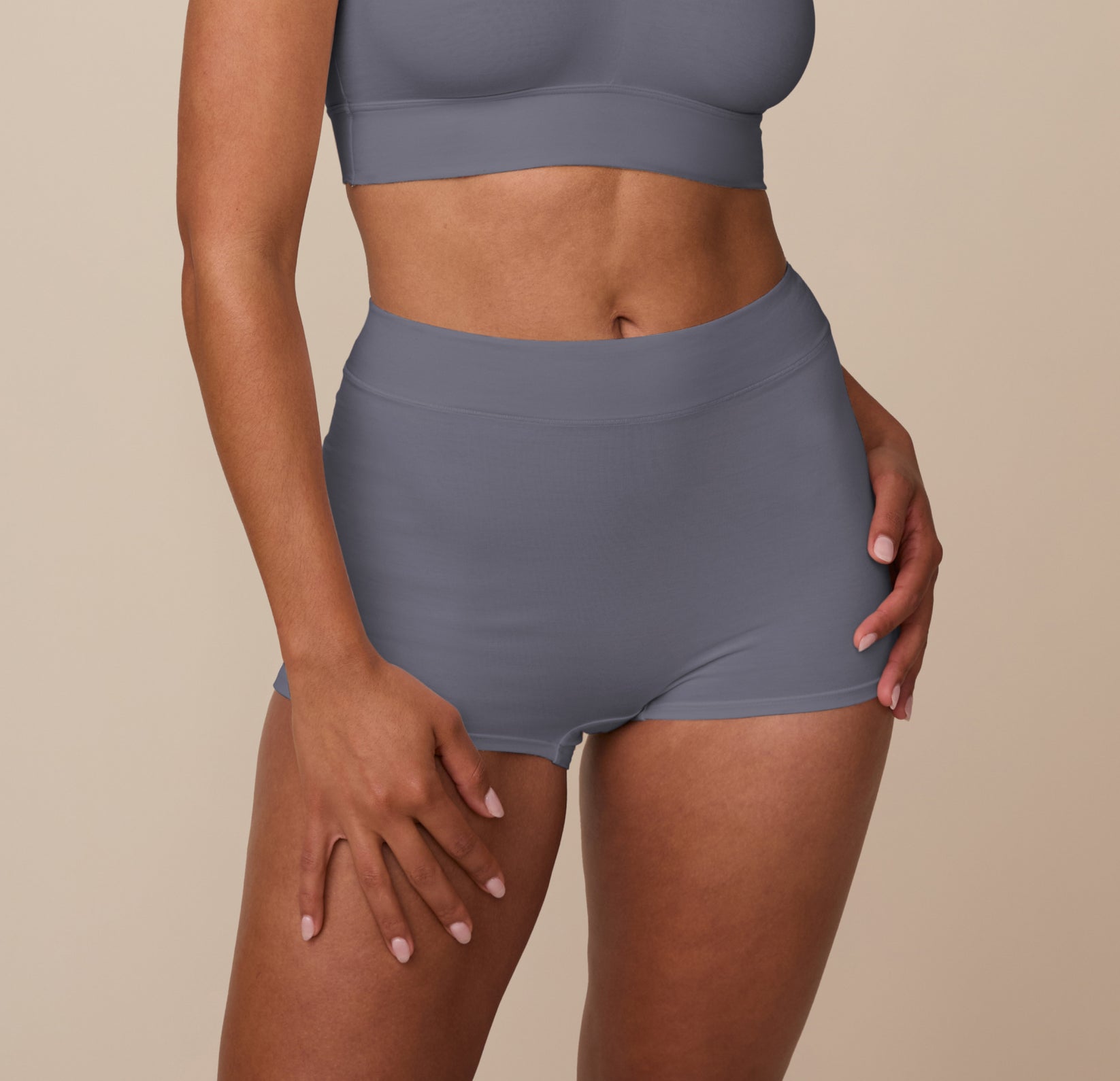 Model wearing the Cloud Cotton Highwaist Boyshort in Slate. The high waistband, minimal seams, and ultra soft cotton fabric are emphasized.