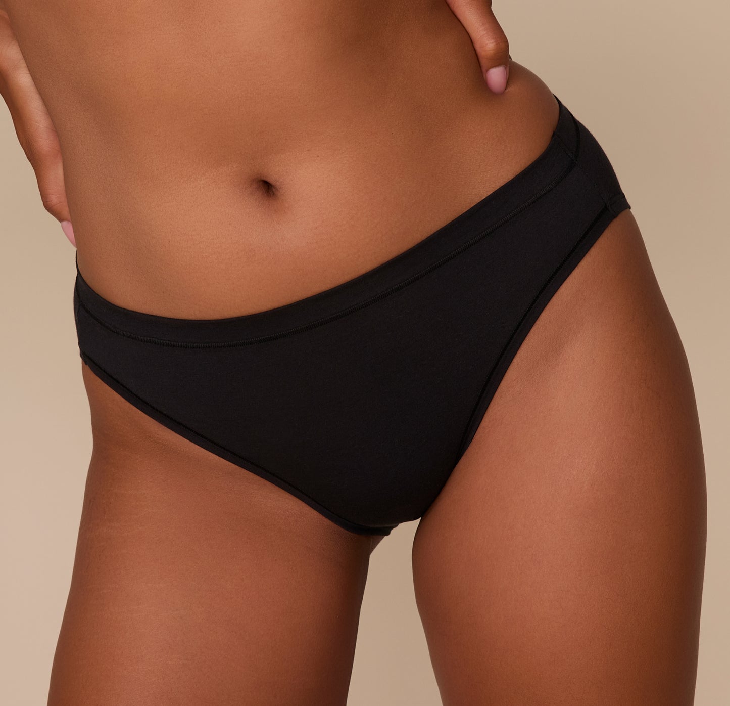 Close-up of the Cloud Cotton French Cut Brief in Black on Victoria, focusing on the double-layer waistband and fine stitching that ensures a soft, secure fit against the skin.