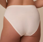 Close-up back view of model Sonnie in the Cloud Cotton French Cut Brief in Quartz. The image highlights the generous back coverage and the no-pinch fit of the waistband.