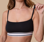 A close-up of the Cloud Cotton Retro Bandeau Bralette in Black, focusing on the ribbed elastic underband, and stretchy comfortable fabric.
