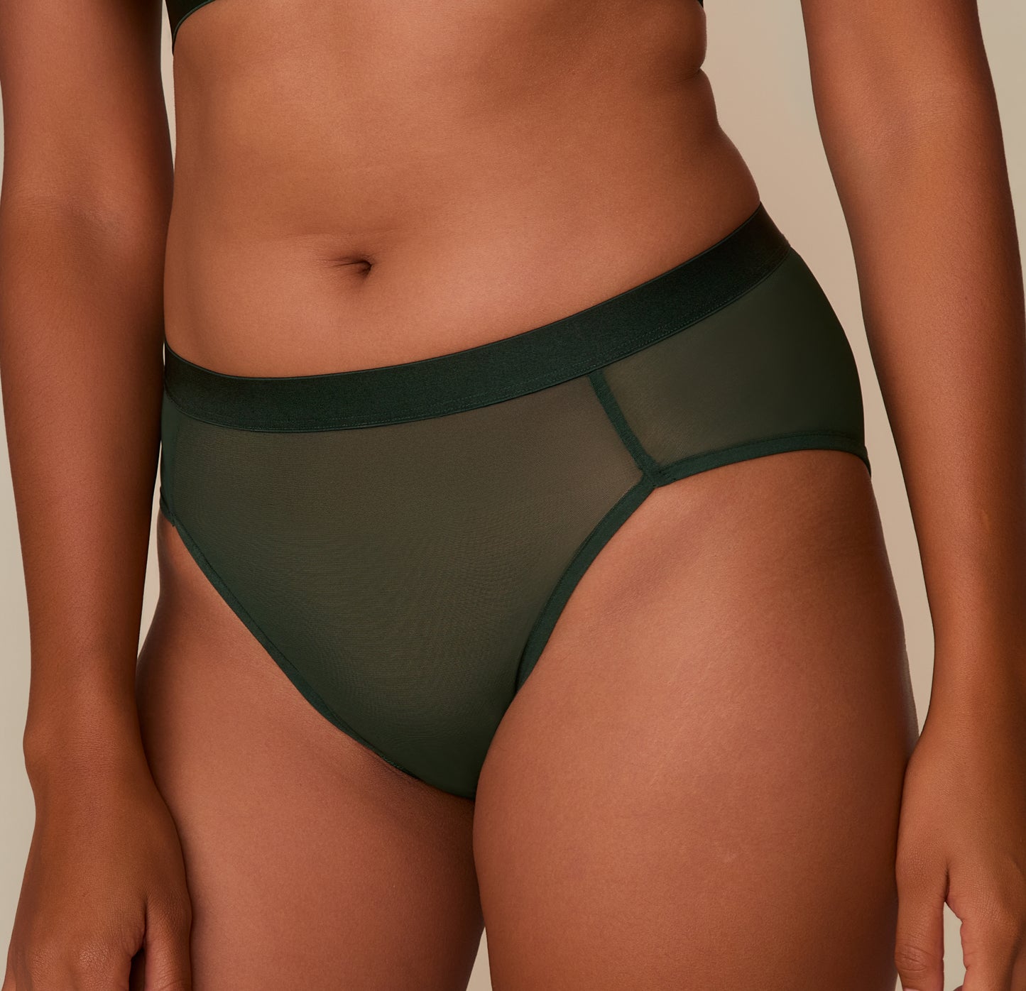 Detailed front view of the ComfortMesh™ Highwaist Brief in Sequoia on Victoria, showing the seamed paneling and breathable sheer mesh finish.