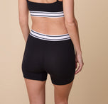 Back view of Gracie in the Cloud Cotton Retro Boxer Brief in Black, showing the smooth, full-coverage fit and the contoured waistband.