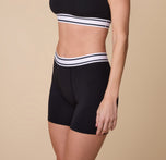 Three quarters profile of Gracie in the Cloud Cotton Retro Boxer Brief in Black, emphasizing the supportive and streamlined silhouette.