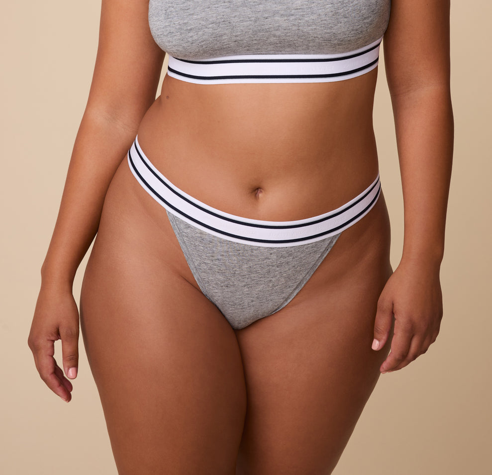 Detailed close-up of the Cloud Cotton Retro French Cut Bikini in Heather Charcoal, with focus on the striped waistband and soft cotton fabric.