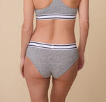 Back view of Gracie in the Cloud Cotton Retro Hiphugger in Heather Charcoal. The full-coverage fit highlights the smooth, breathable cotton fabric and the comfortable stretch waistband.