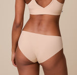 A back view of Ally in the No-Show Hiphugger, showing its seamless construction and curve-hugging fit.