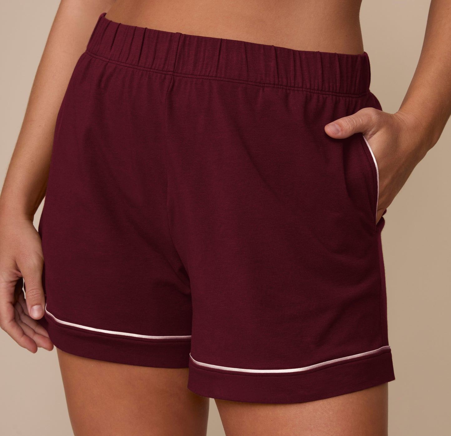 Close-up front view of the Perfect Pima Pajama Shorts in Bordeaux. The image focuses on the contrast white piping and functional side pockets.