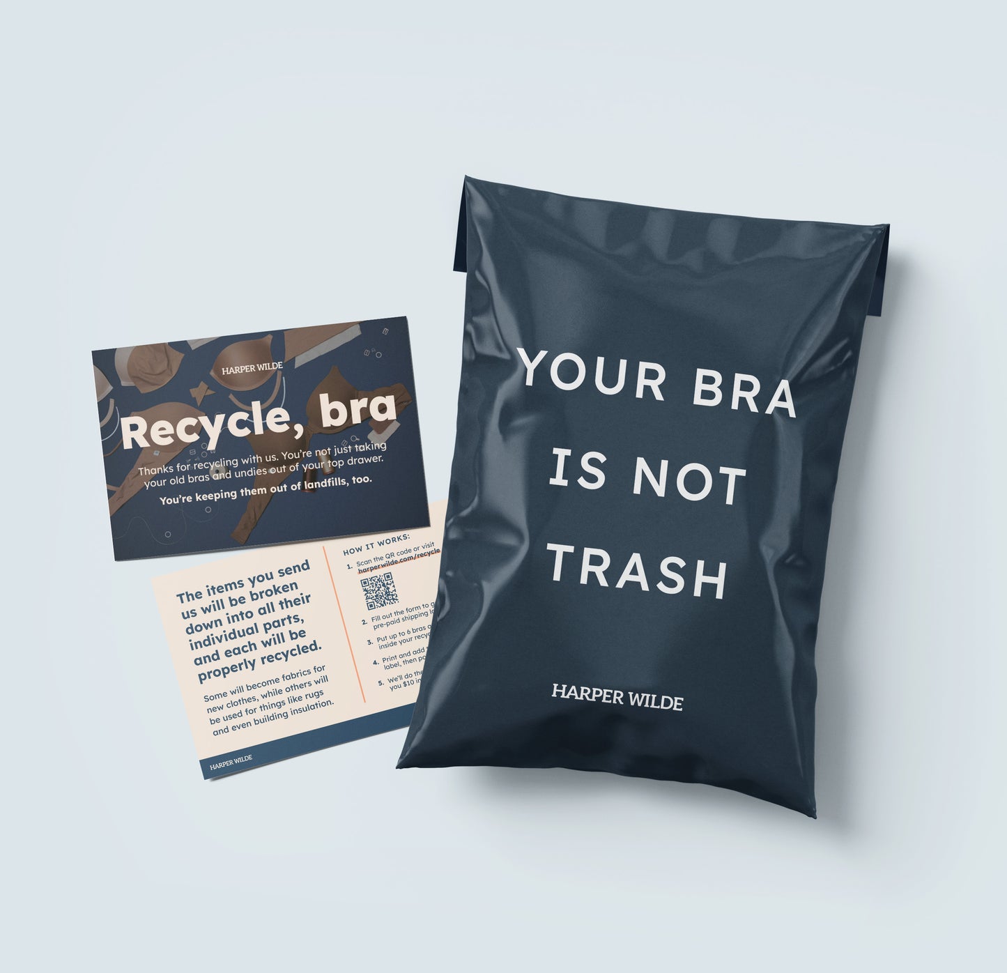 Flat lay of a Harper Wilde recycling bag and instructional insert against a light blue background.
