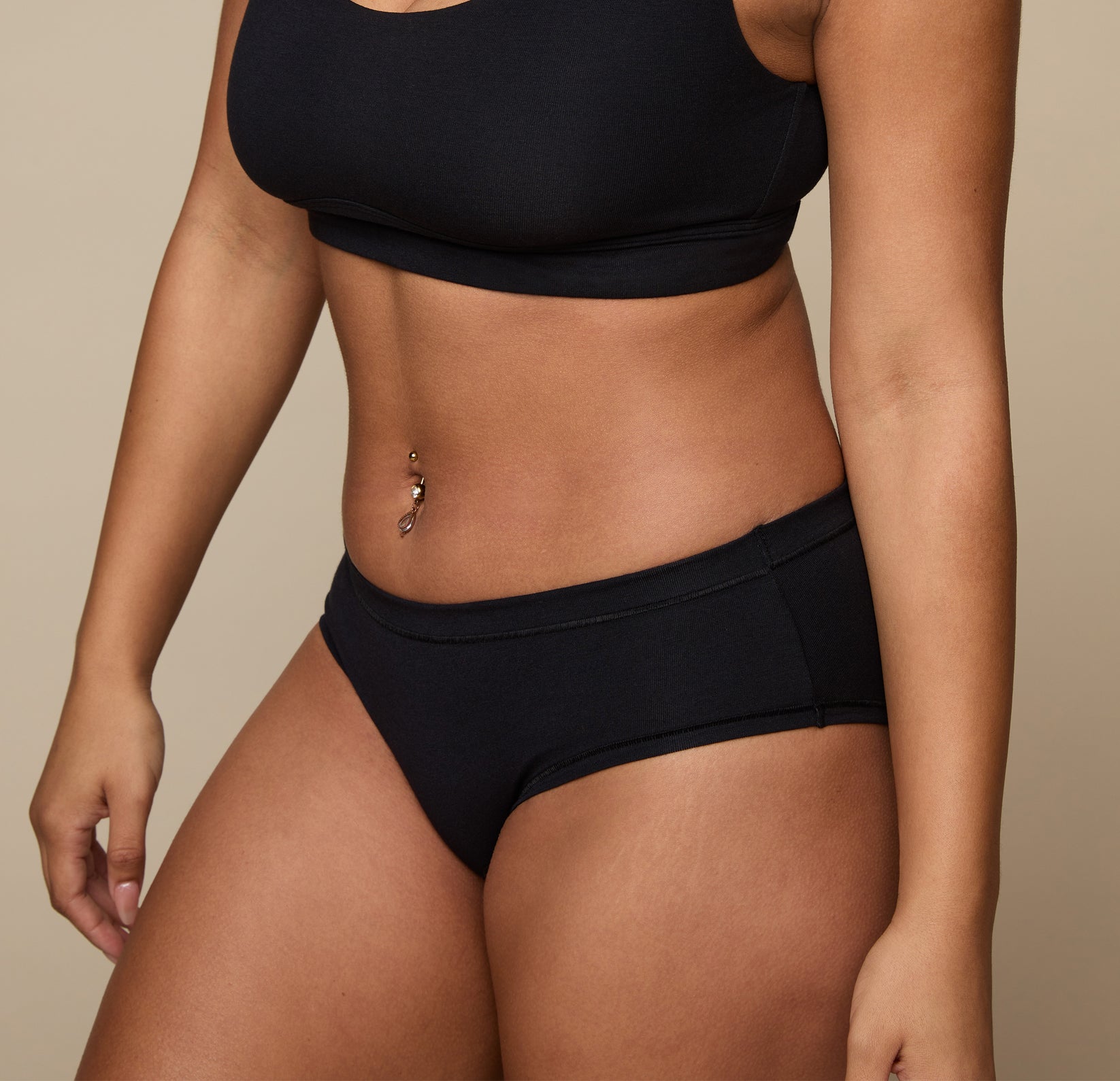 Woman wearing the Cloud Cotton Hiphugger underwear in the color Black