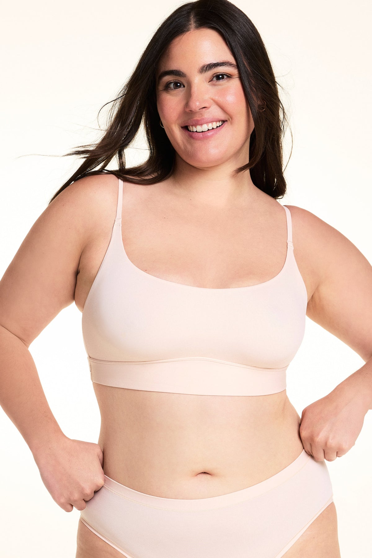Front view of the Bliss Thin-Strap Scoop Bralette in Rose. sizing: Alessandra wears size Large
