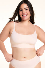 Front view of the Bliss Thin-Strap Scoop Bralette in Rose. sizing: Alessandra wears size Large