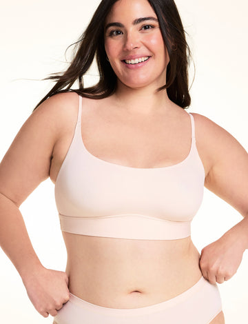 Front view of the Bliss Thin-Strap Scoop Bralette in Rose. sizing: Alessandra wears size Large
