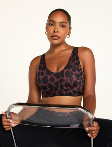 Editorial on-model shot of the Bliss Bralette in Bliss Leopard styled with the Bliss French Cut Brief in Bliss Leopard. sizing: Amber wears size Medium