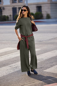 Lifestyle on-model shot of the Cloud Cotton Long Sleeve T-Shirt in Olive paired with the Cloud Cotton Pant in Olive.