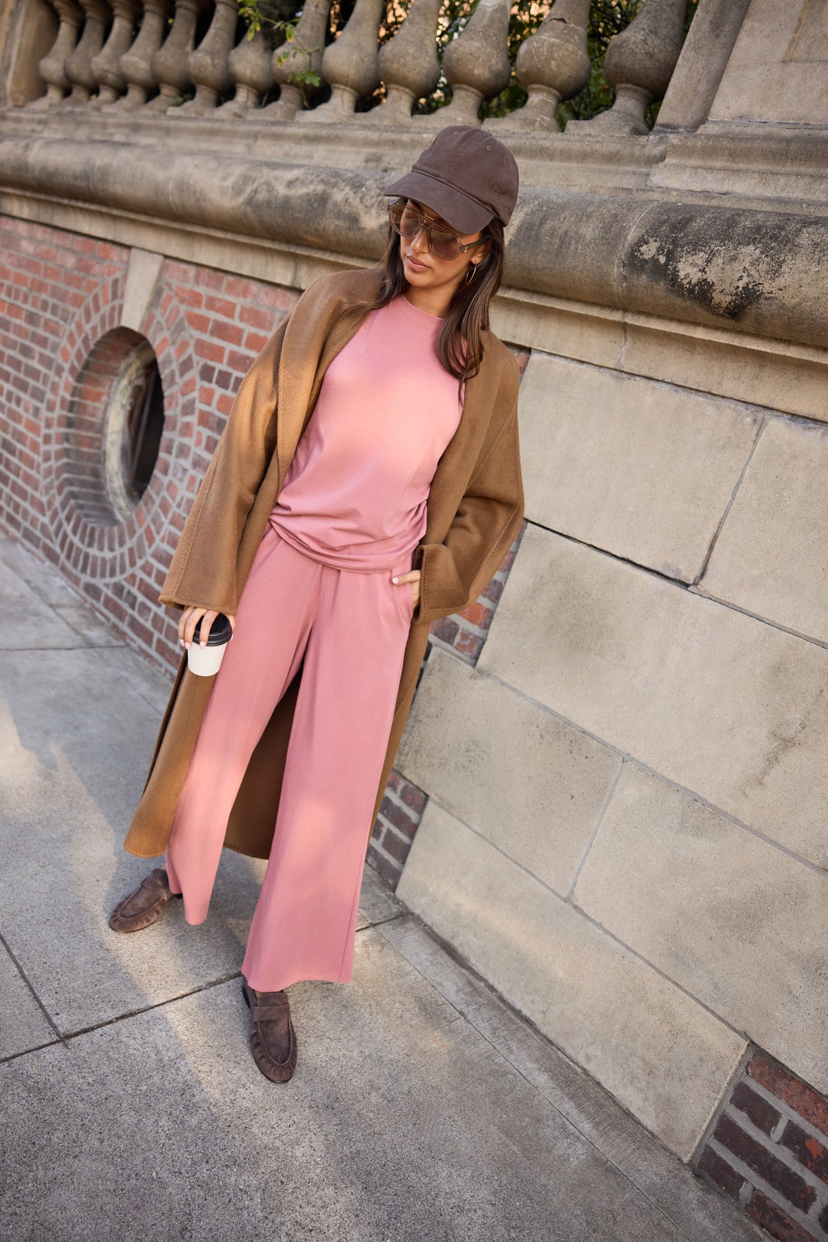 Lifestyle on-model shot of the Cloud Cotton Long Sleeve T-Shirt in Winter Rose paired with the Cloud Cotton Pant in Winter Rose.