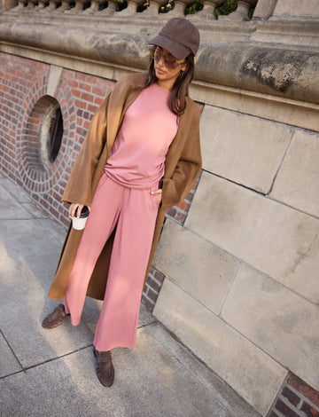 Lifestyle on-model shot of the Cloud Cotton Long Sleeve T-Shirt in Winter Rose paired with the Cloud Cotton Pant in Winter Rose.