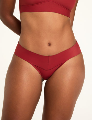 Front on-model shot of the Bliss Low Rise Bikini in Ruby paired with the BlissSmooth Bralette in Ruby. sizing: Amber wears size Medium 