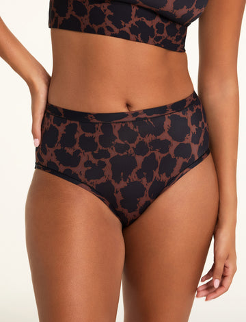 Front on-model shot of the Bliss Highwaist Brief in Leopard paired with the Bliss Square Neck Bralette in Leopard. sizing: Kushi wears size Small