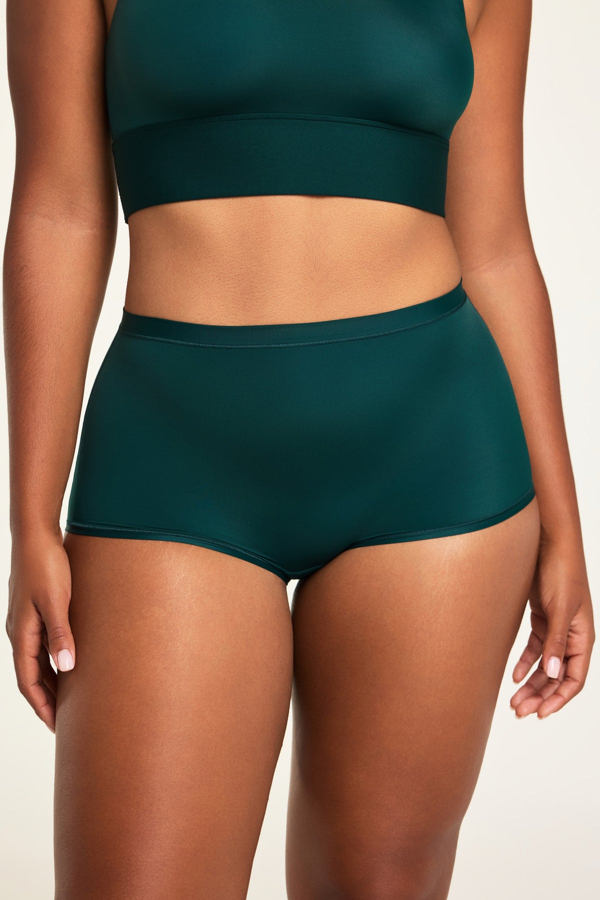 Front on-model shot of the Bliss Boyshort in Pine paired with the Bliss Square Neck Bralette in Pine.