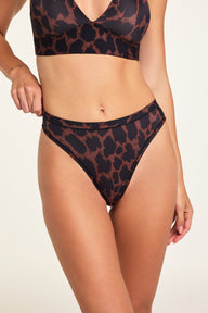 Front on-model shot of the Bliss Thong in Leopard paired with the Bliss Triangle Bralette in Leopard.