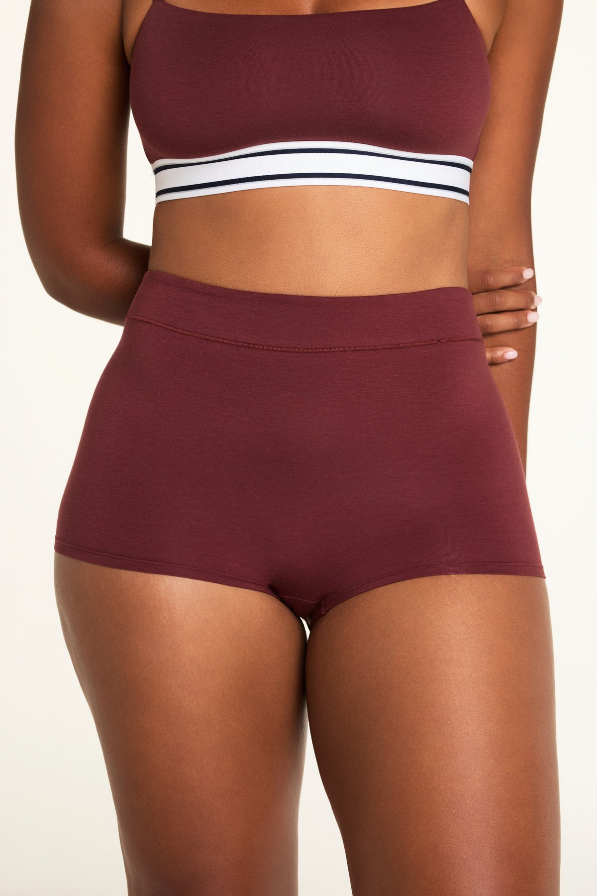 Front on-model shot of the Cloud Cotton Highwaist Boyshort in Cabernet paired with the Cloud Cotton Bandeau Bralette in Cabernet.