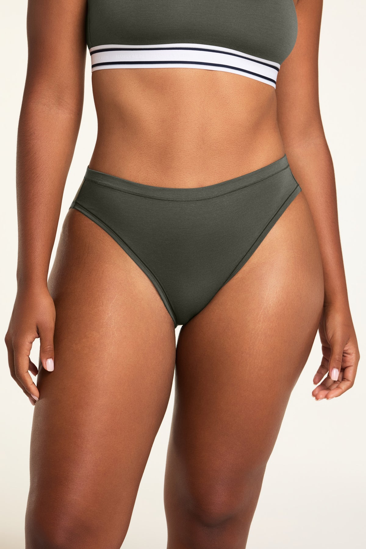 Front on-model shot of the Cloud Cotton French Cut Brief in Olive paired with the Cloud Cotton Bandeau Bralette in Olive.