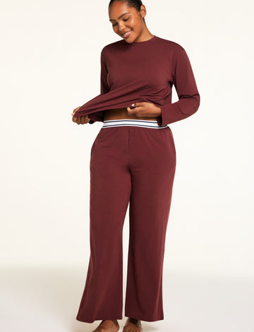 Front on-model shot of the Cloud Cotton Pant in Cabernet paired with the Cloud Cotton Long Sleeve T-Shirt in Cabernet.