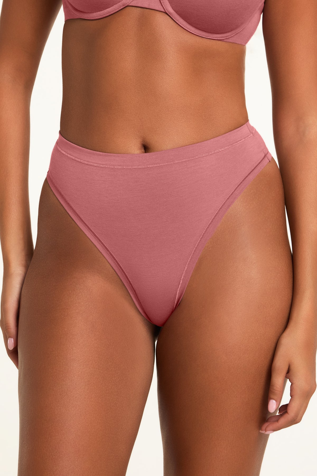 Front on-model shot of the Cloud Cotton Highwaist Thong in Winter Rose paired with the Cloud Cotton T-Shirt Bra in Winter Rose.