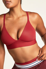 Front on-model shot of the Bliss Triangle Bralette in Ruby paired with the Bliss Thong in Ruby.