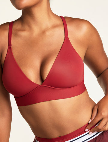 Front on-model shot of the Bliss Triangle Bralette in Ruby paired with the Bliss Thong in Ruby. sizing: Amber wears size Medium